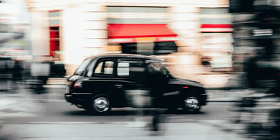 A London taxi cab in "high-speed" environment